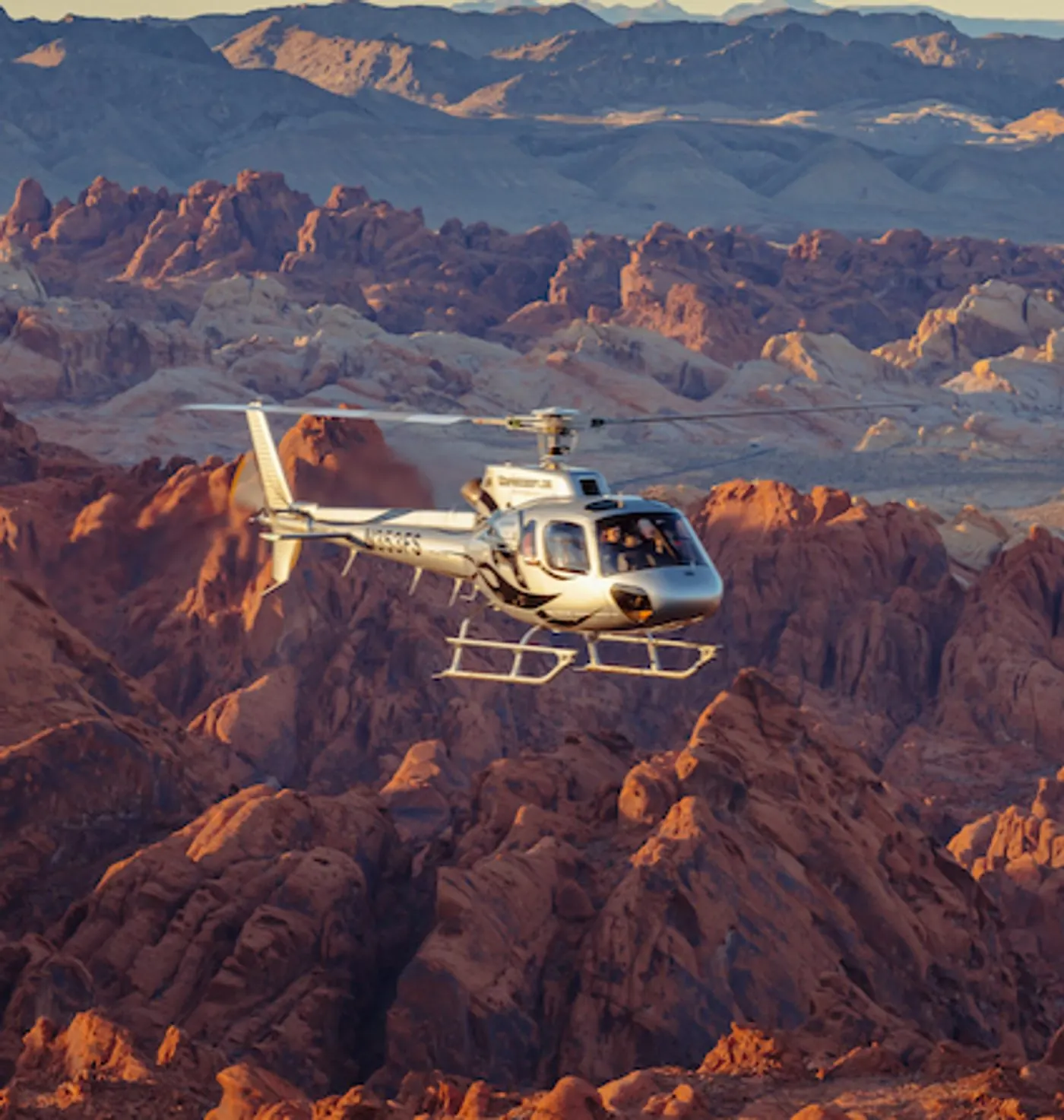 Silver 5 Star helicopter on the ground in Valley of Fire