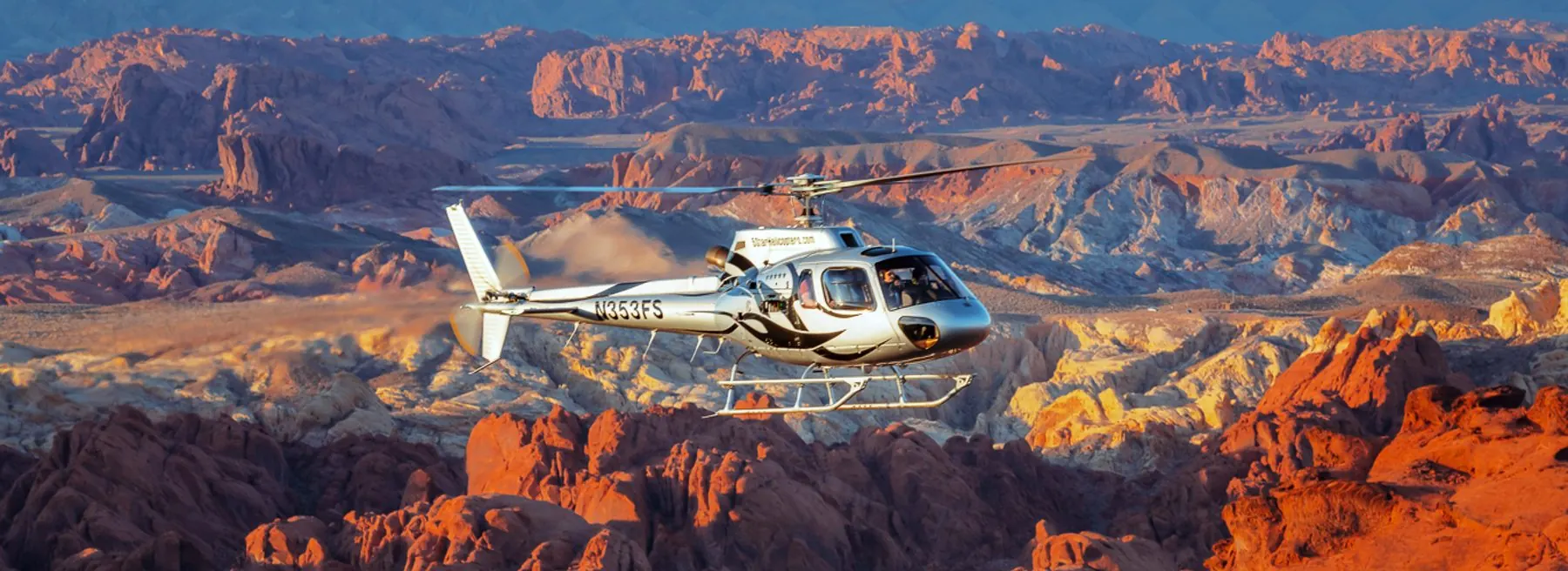 Helicopter flying over the red sandstone of Valley of Fire